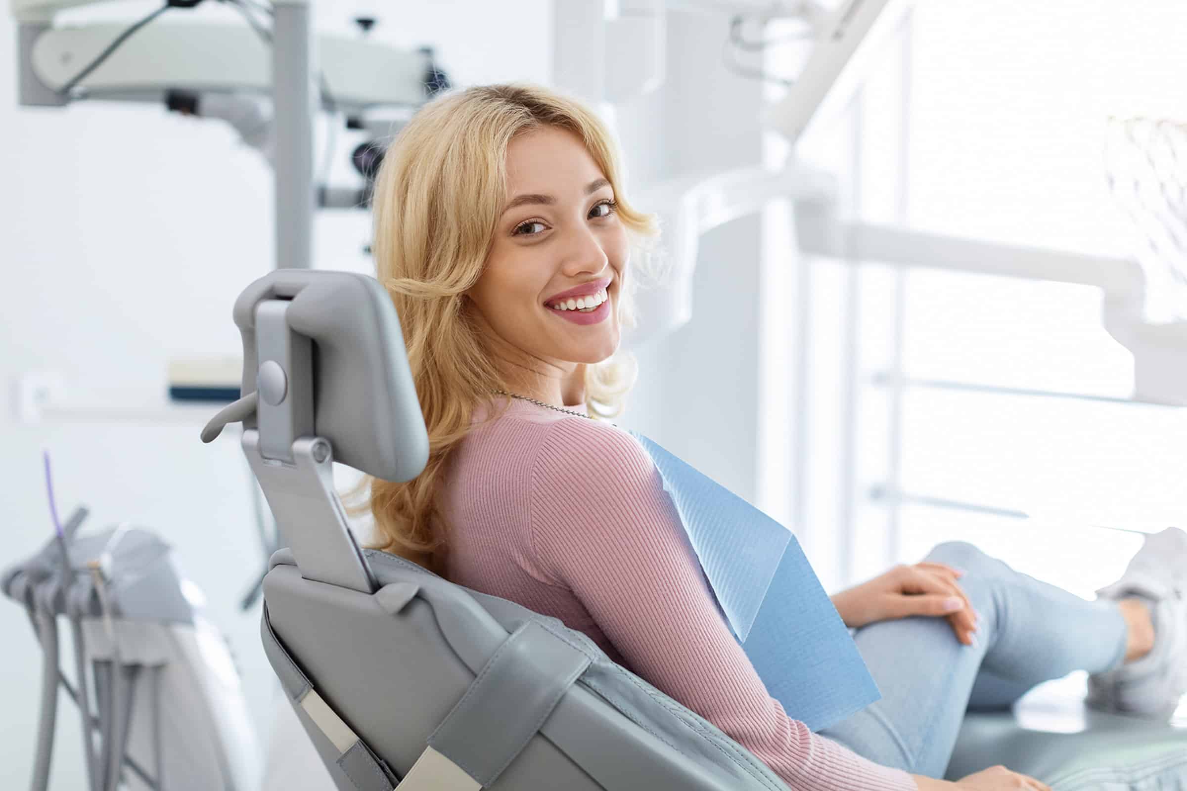 Woman smiling at a general dental appointment in Lone Tree, CO