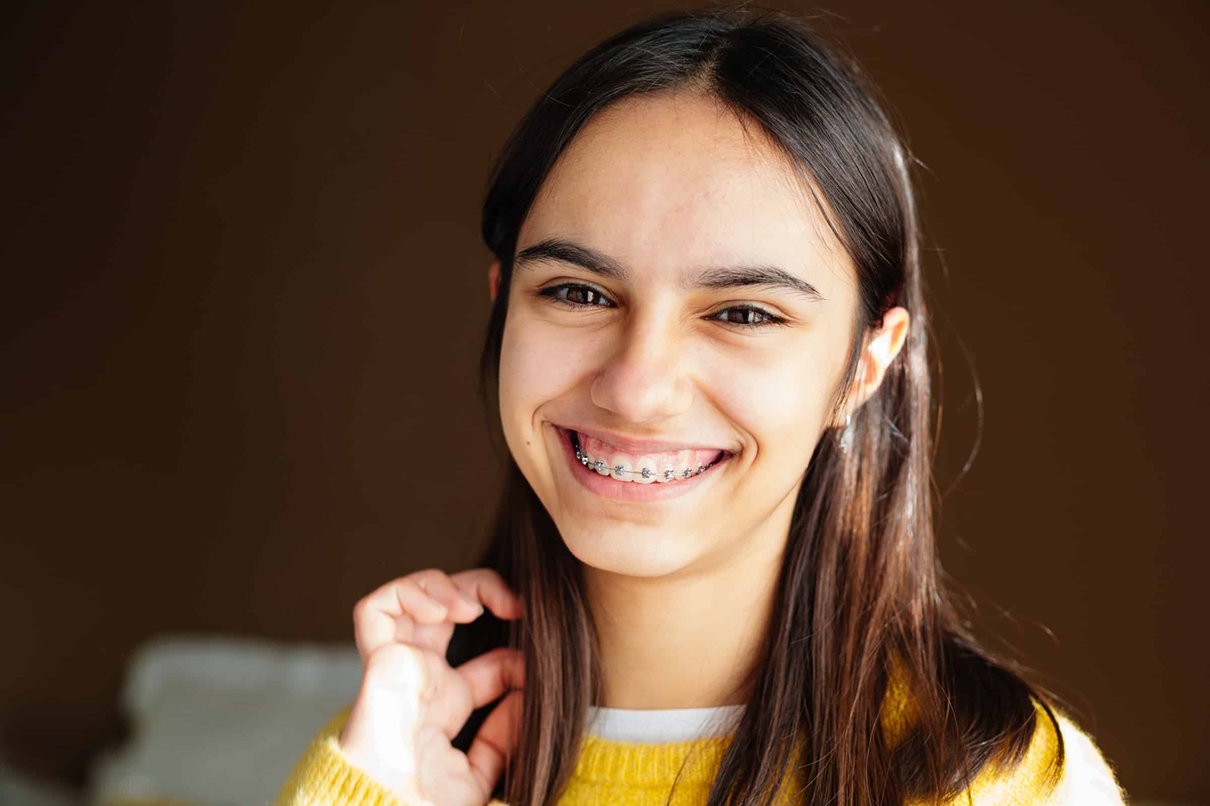 Girl smiling with braces in Lone Tree, CO